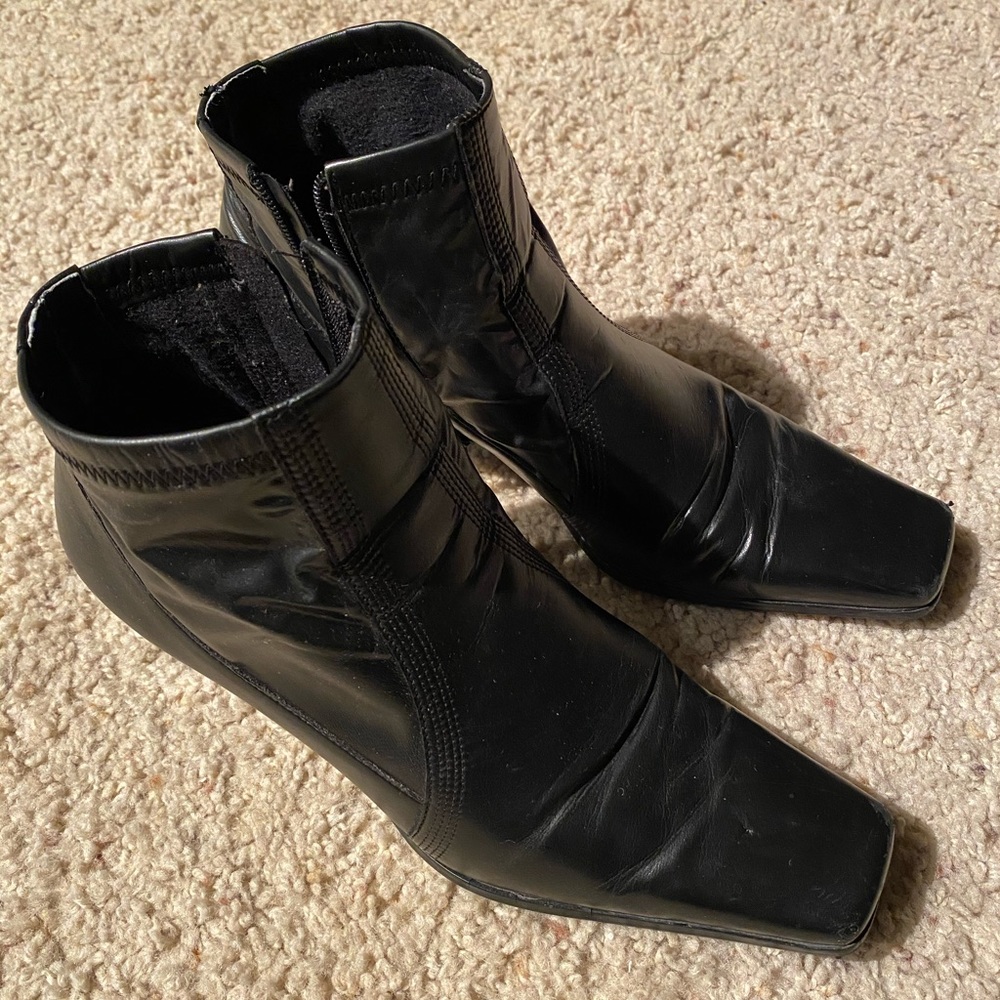Black ankle booties by Franco Sarto